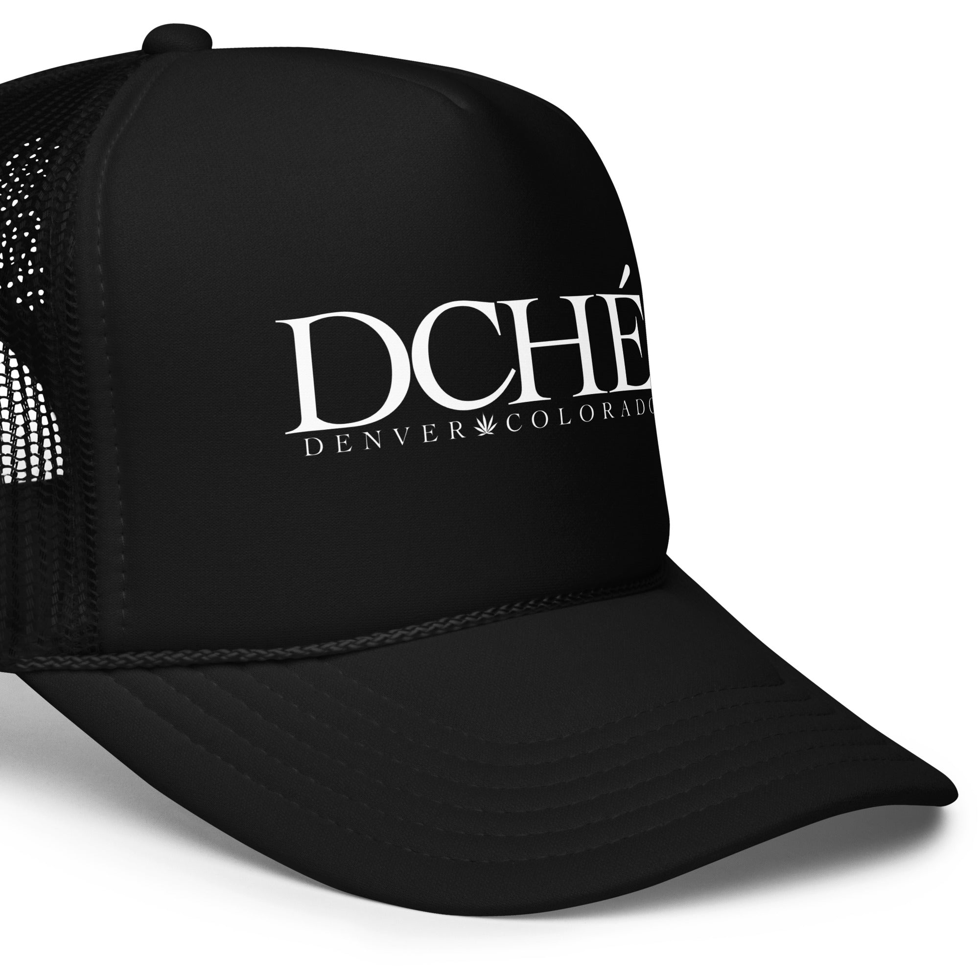 DCHÉ Trucker Hat detail — structured brim and embroidered logo close-up
