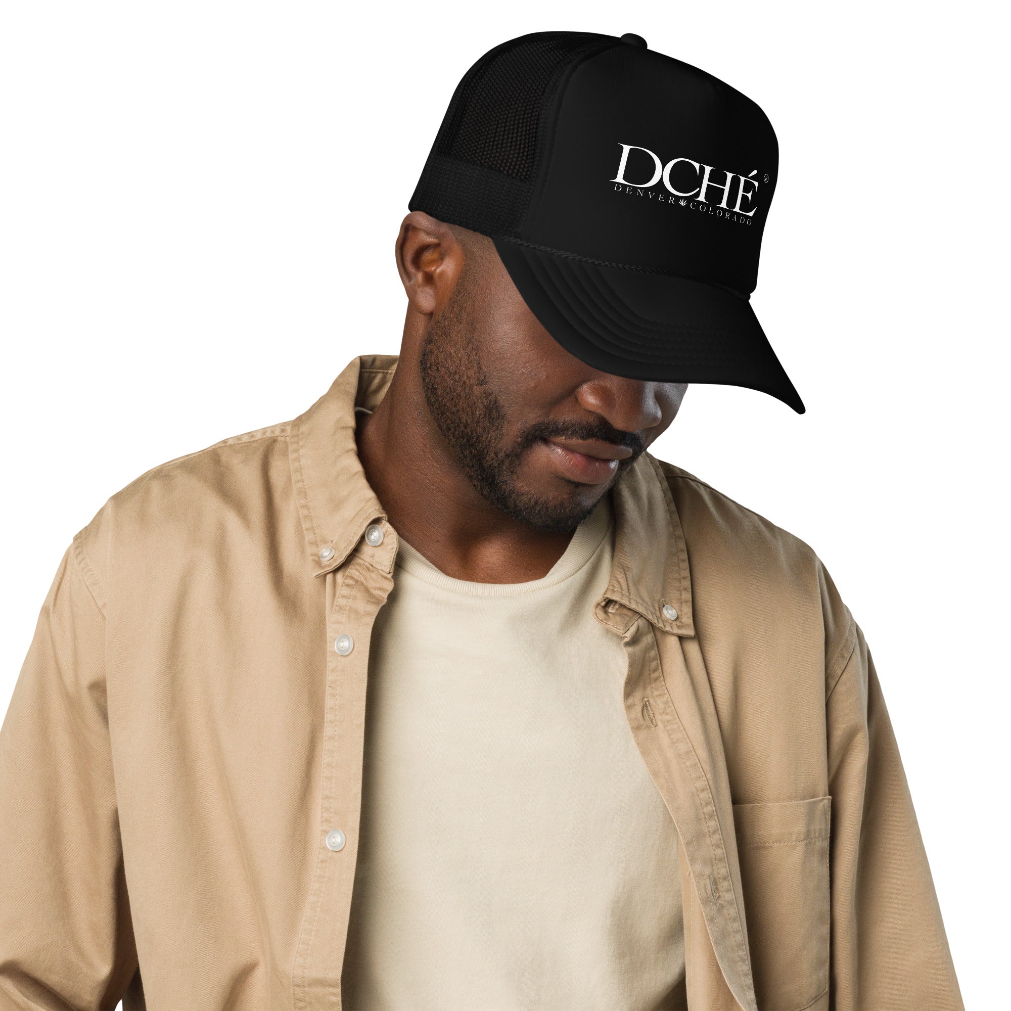 DCHÉ Trucker Hat lifestyle shot — casual outdoor streetwear look